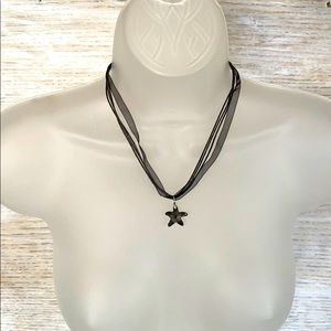 Black glass starfish pendant necklace